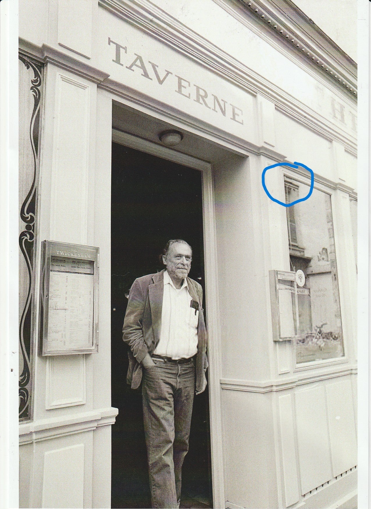 Photograph of Charles Bukowski in Front of Taverne