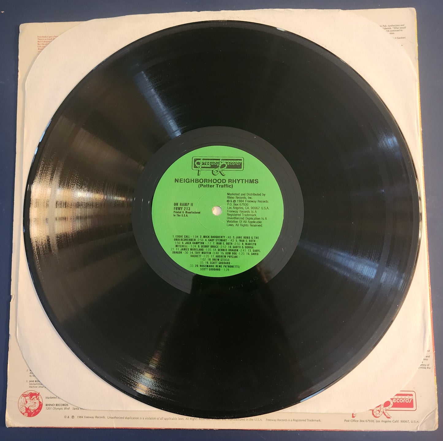 Neighborhood Rhythms Vinyl LP with “I Don't Need A Cleopatra” read by Charles Bukowski